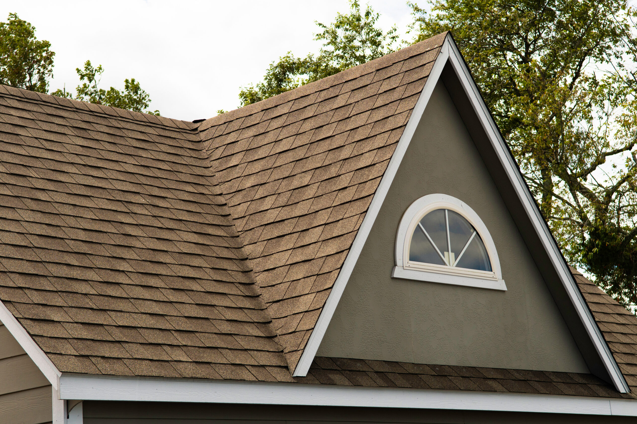 Brown Asphalt Shingle Roofing On Sage Green House