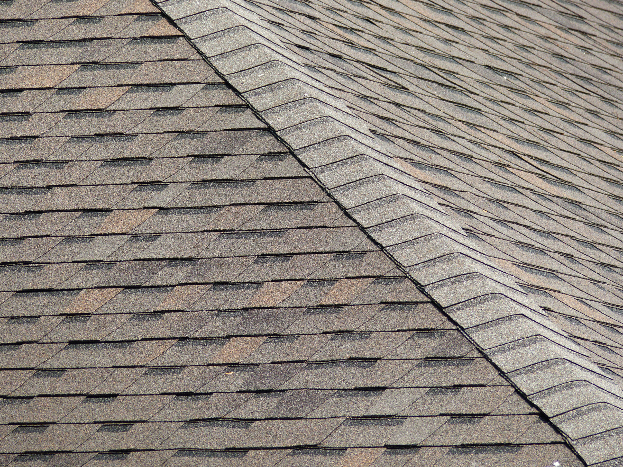 Close View Of Asphalt Shingles On Roof